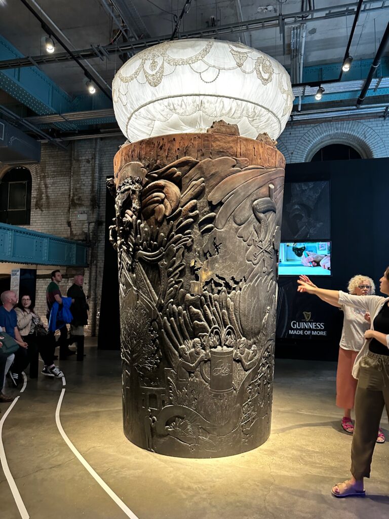 A carved art piece made to look like a pint of Guinness. 